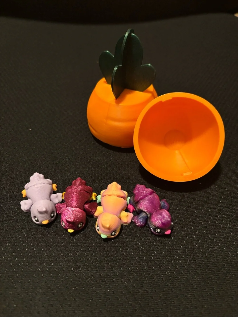 3D printed carrot container with 4 chicks